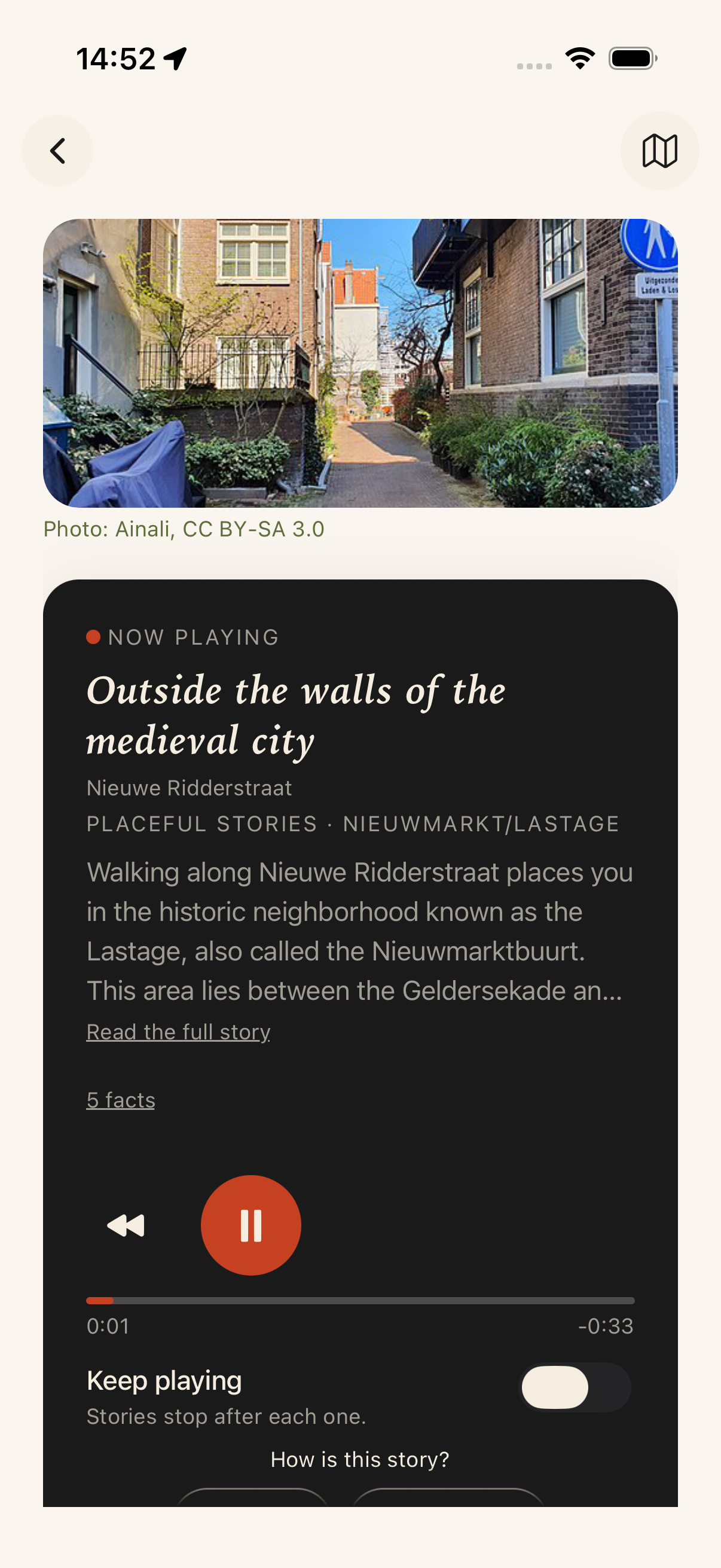 The audio player for Outside the walls of the medieval city, with a place photograph and playback controls.