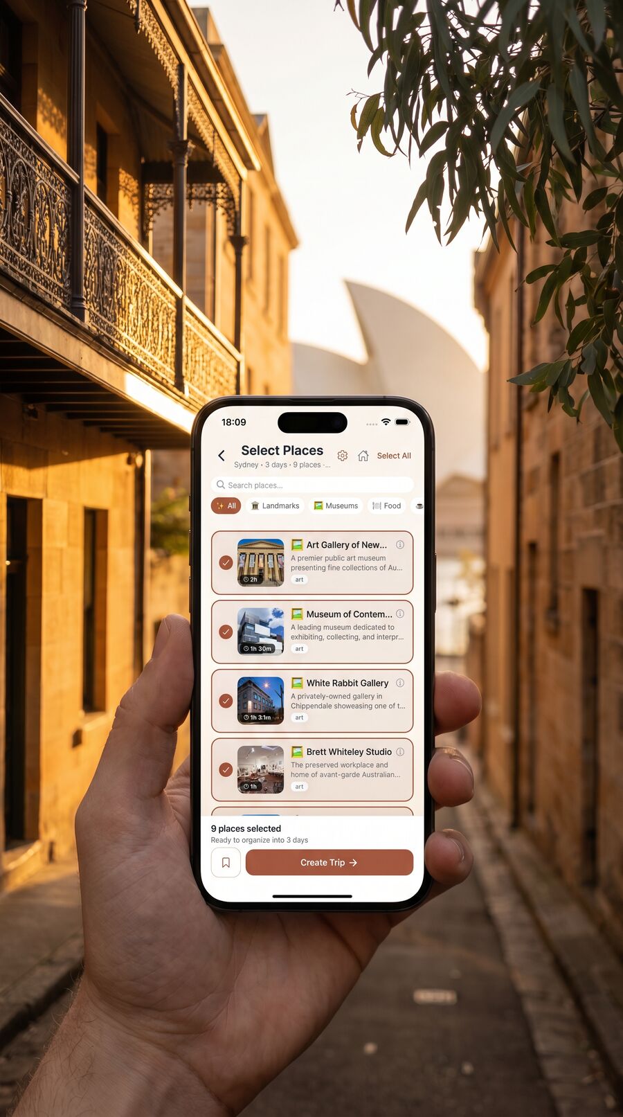 Hand holding iPhone showing Placeful Select Places for Sydney in The Rocks sandstone laneway